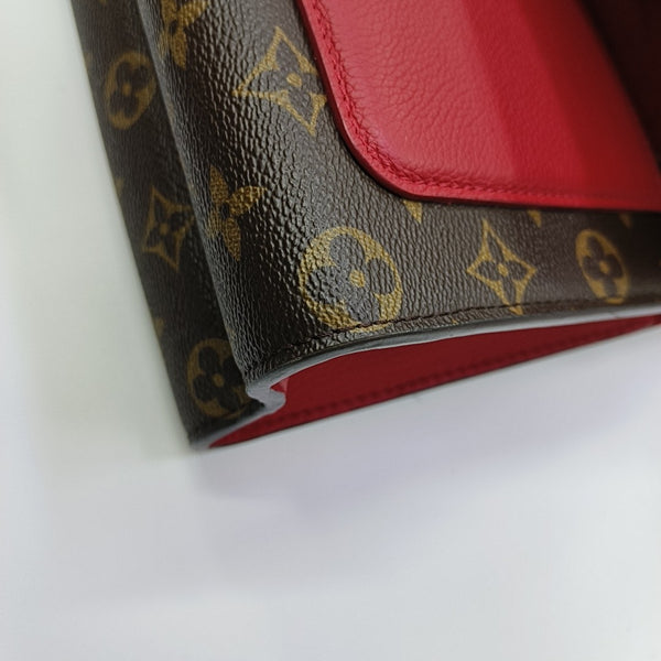 VICTOIRE Monogram Coated Canvas Brown