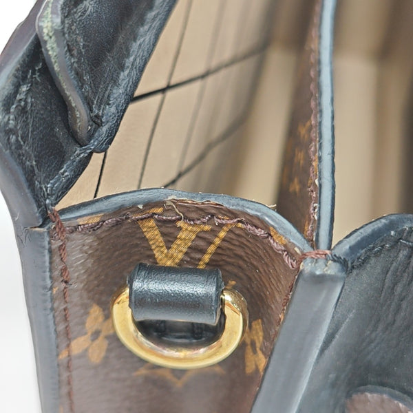 TRUNK Monogram Coated Canvas Brown