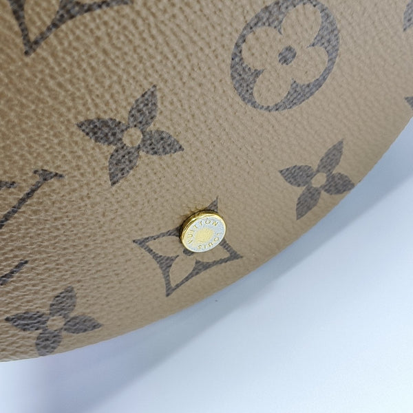 CANNES PM Monogram Coated Canvas Brown