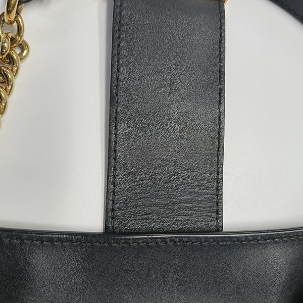 Padlock Medium Monogram Coated Canvas Brown