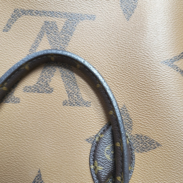 ONTHEGO MM Monogram Coated Canvas Brown