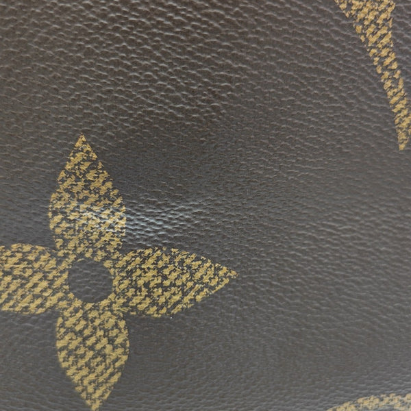 ONTHEGO MM Monogram Coated Canvas Brown