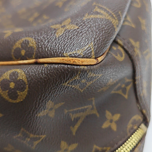 EXCURSION Monogram Coated Canvas Brown