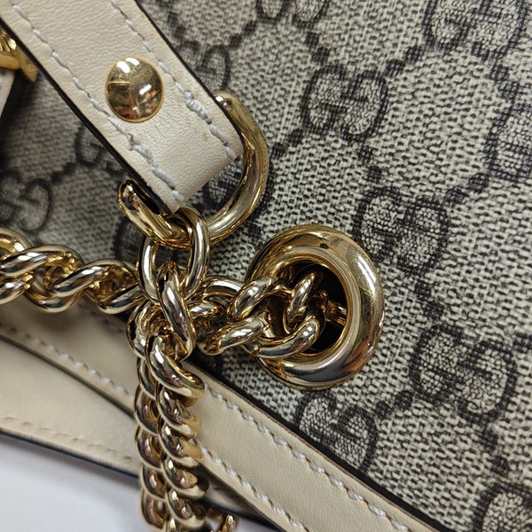 Padlock Medium Monogram Coated Canvas Beige