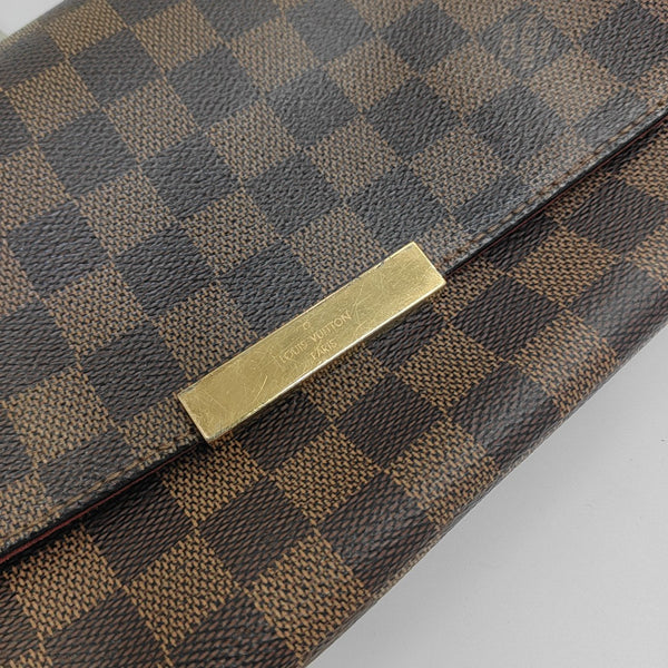 FAVORITE PM Damier Ebene Coated Canvas Brown