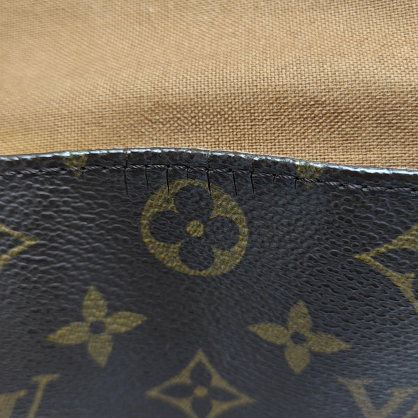 LOOPING PM Monogram Coated Canvas Brown