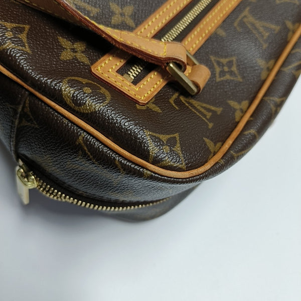 CITE MM Monogram Coated Canvas Brown