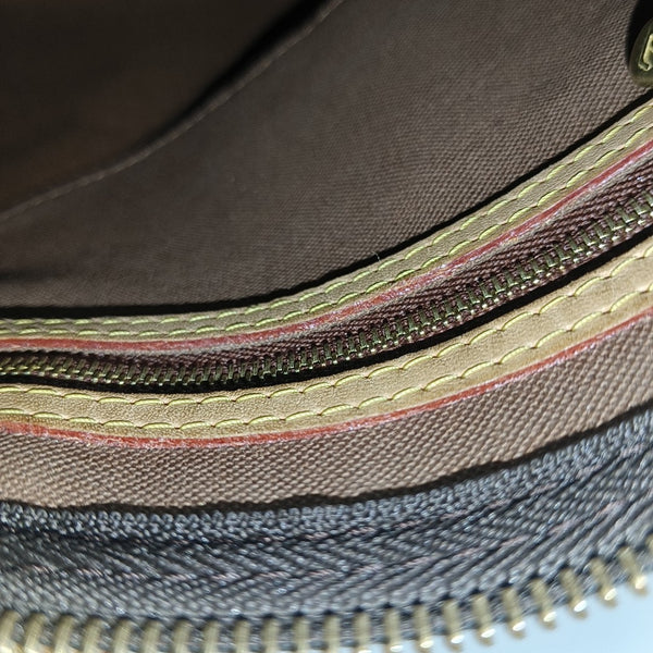 SPEEDY 25 Monogram Coated Canvas Brown