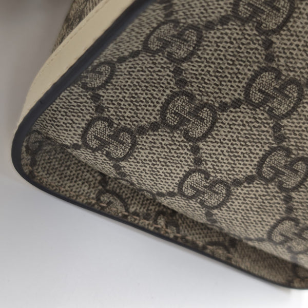 Padlock Small Monogram Coated Canvas Beige