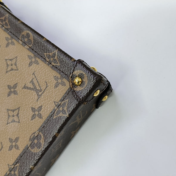 TRUNK Monogram Coated Canvas Brown