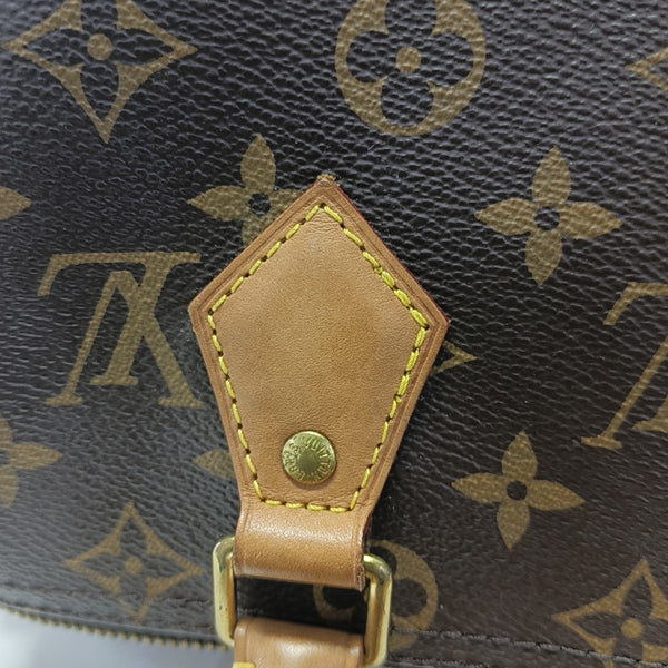 SPEEDY 25 Monogram Coated Canvas Brown