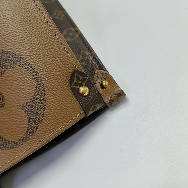 ONTHEGO GM Monogram Coated Canvas Brown