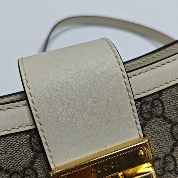 Padlock Small Monogram Coated Canvas Beige