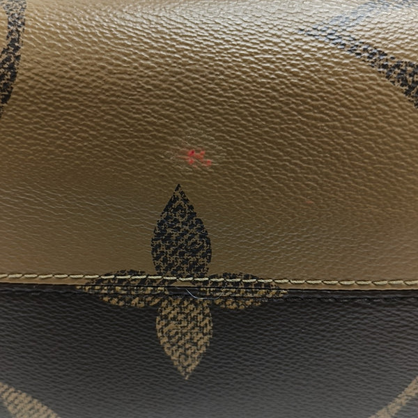 ONTHEGO MM Monogram Coated Canvas Brown