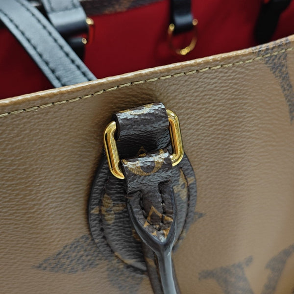 ONTHEGO MM Monogram Coated Canvas Brown