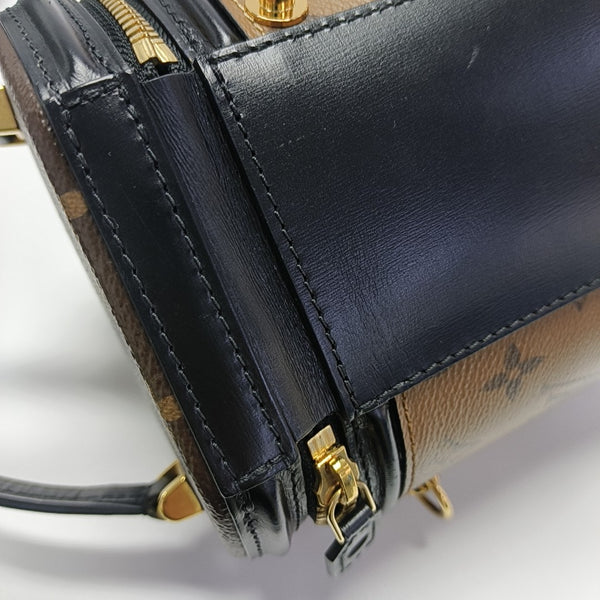 CANNES PM Monogram Coated Canvas Brown