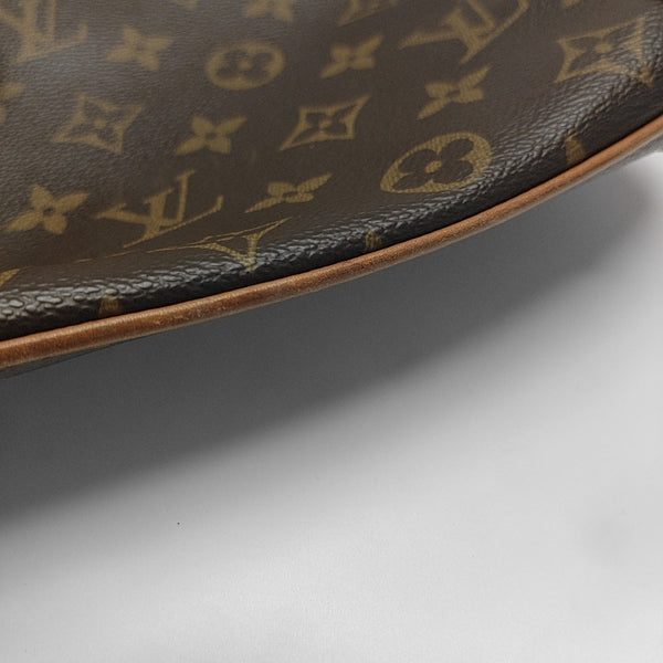 COUSSIN GM Monogram Coated Canvas Brown