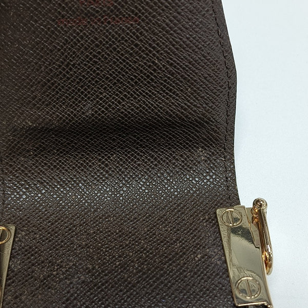 Damier Ebene Coated Canvas Clutch Brown