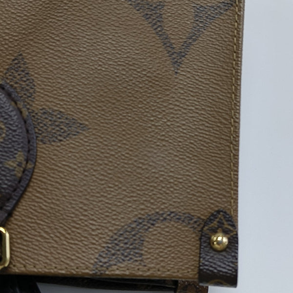 ONTHEGO MM Monogram Coated Canvas Brown