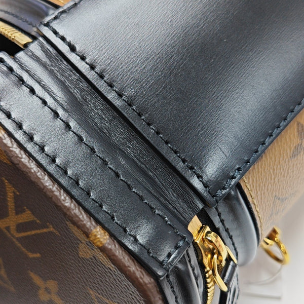 CANNES PM Monogram Coated Canvas Brown