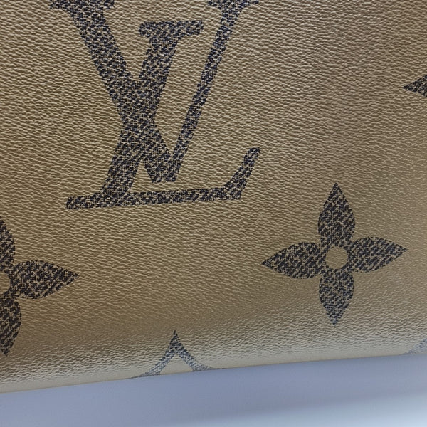 ONTHEGO MM Monogram Coated Canvas Brown