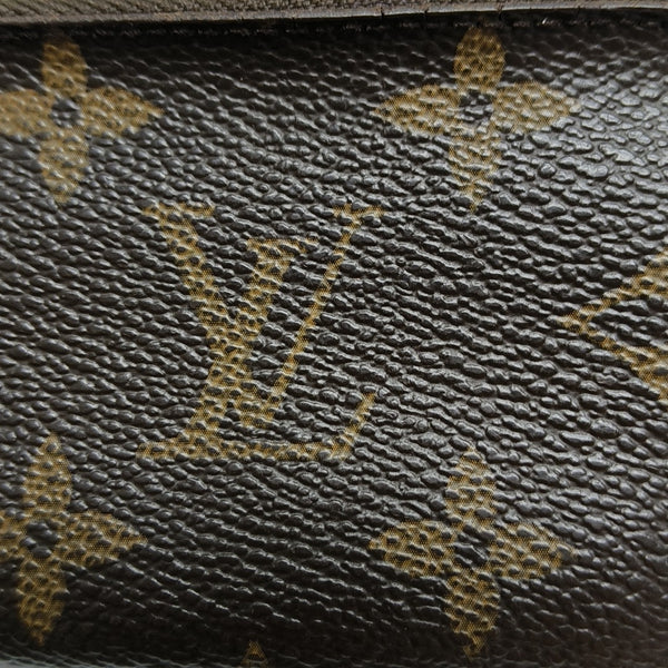Monogram Coated Canvas Clutch Brown