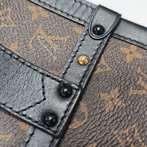 TRUNK Monogram Coated Canvas Brown