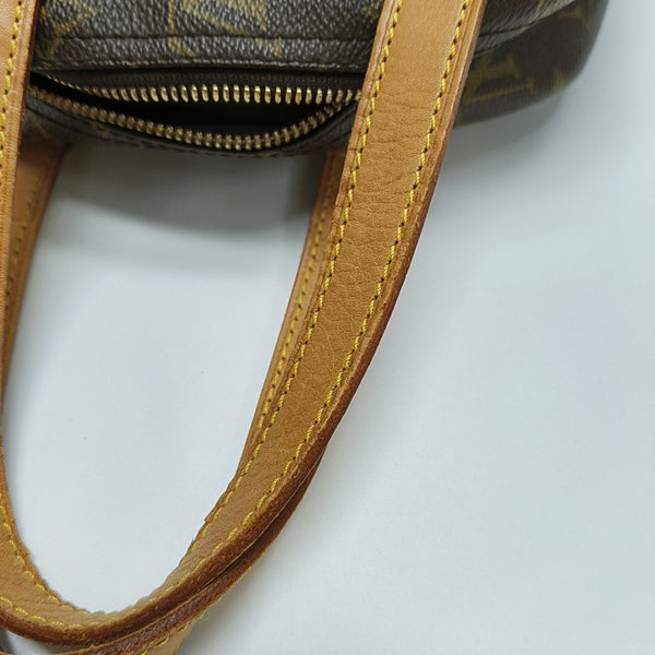 EXCURSION Monogram Coated Canvas Brown