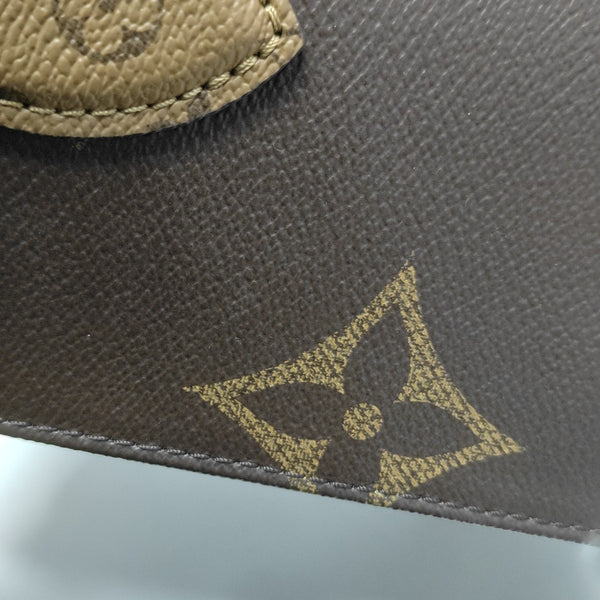 ONTHEGO PM Monogram Coated Canvas Brown