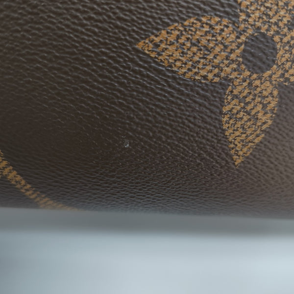 ONTHEGO MM Monogram Coated Canvas Brown