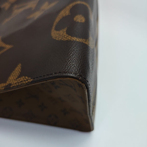 ONTHEGO GM Monogram Coated Canvas Brown