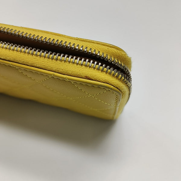 Authenticated pre-owned WOC Quilted Lambskin Yellow Wallet - Wallet at Looply