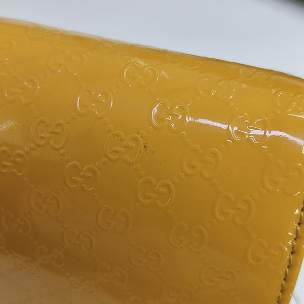 Monogram Patent Leather Clutch Yellow