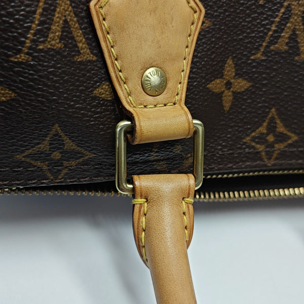 SPEEDY 25 Monogram Coated Canvas Brown