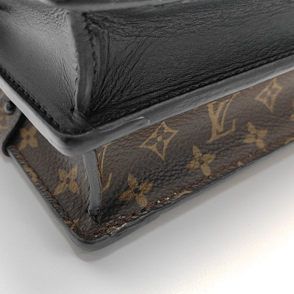 TRUNK Monogram Coated Canvas Brown