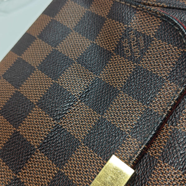 FAVORITE PM Damier Ebene Coated Canvas Brown