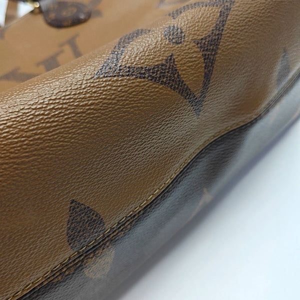 ONTHEGO MM Monogram Coated Canvas Brown