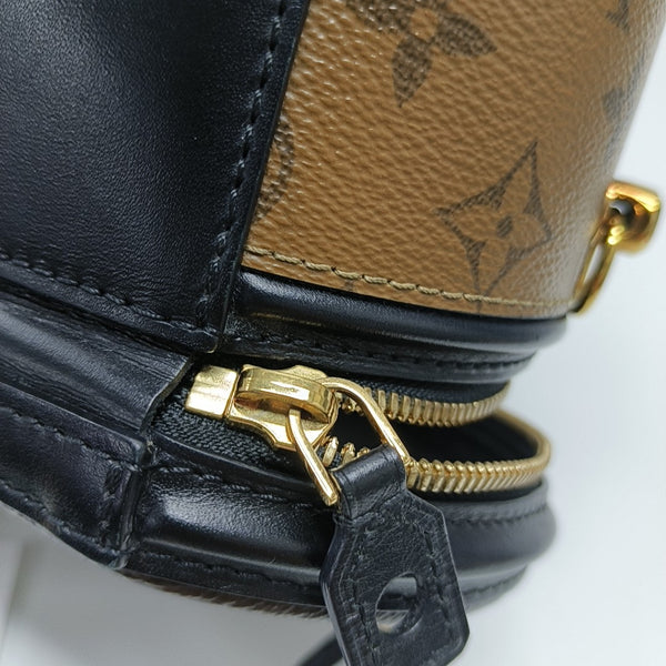 CANNES PM Monogram Coated Canvas Brown