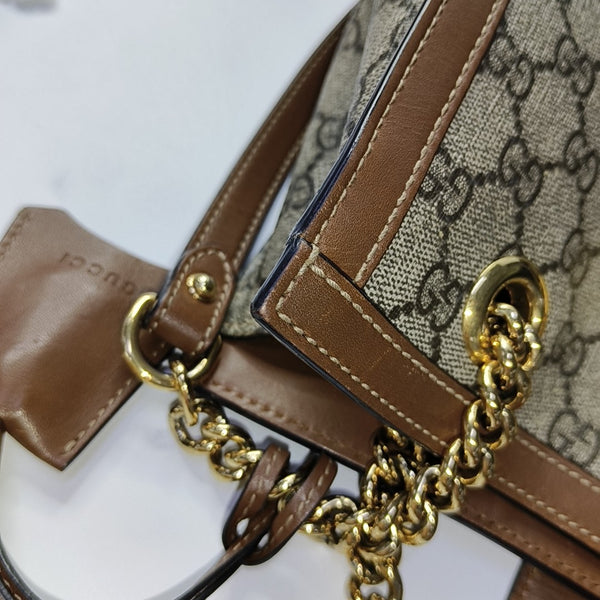 Padlock Small Monogram Coated Canvas Beige
