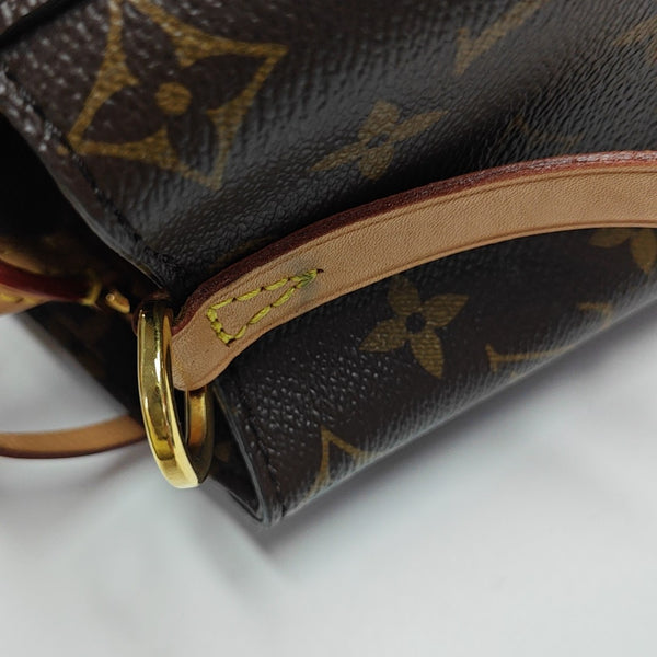 MONTAIGNE Monogram Coated Canvas Brown