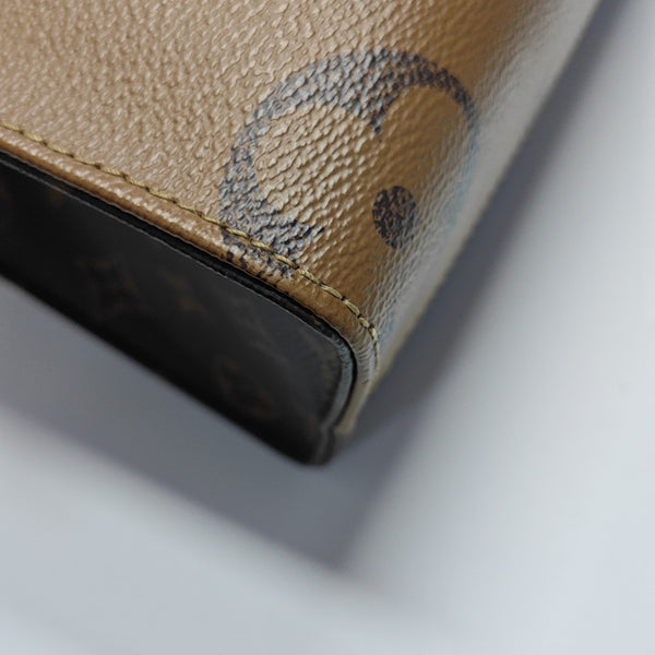 ONTHEGO PM Monogram Coated Canvas Brown