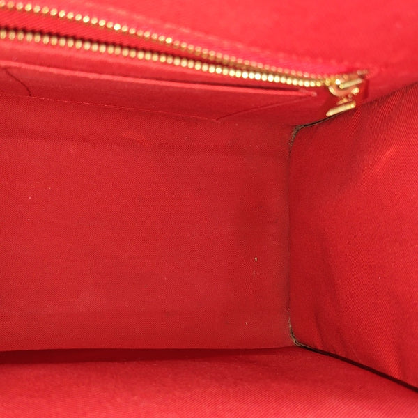 ONTHEGO MM Monogram Coated Canvas Brown