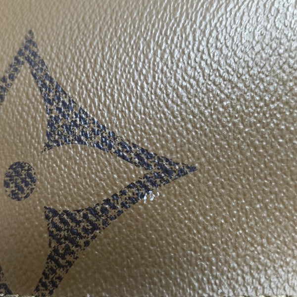 ONTHEGO MM Monogram Coated Canvas Brown