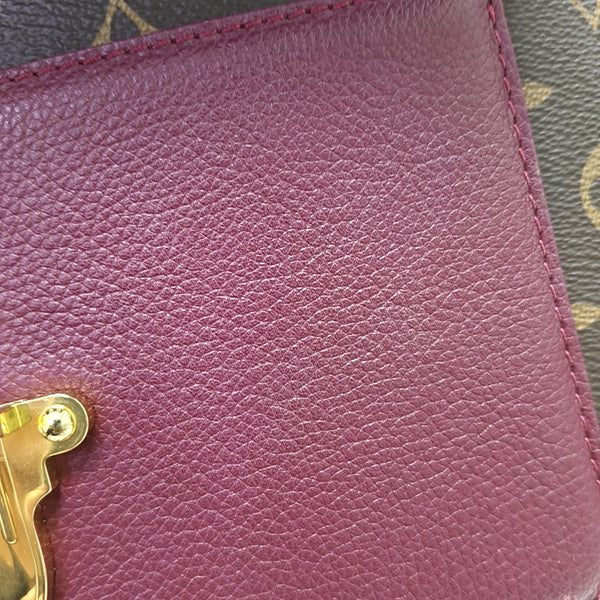 VICTOIRE Monogram Coated Canvas Brown
