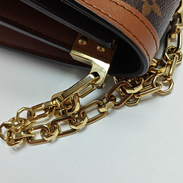 DAUPHINE MM Monogram Coated Canvas Brown