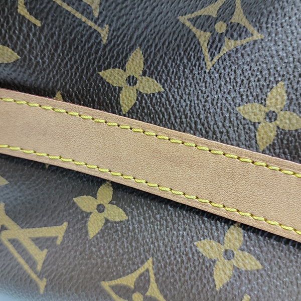 SPEEDY 25 Monogram Coated Canvas Brown