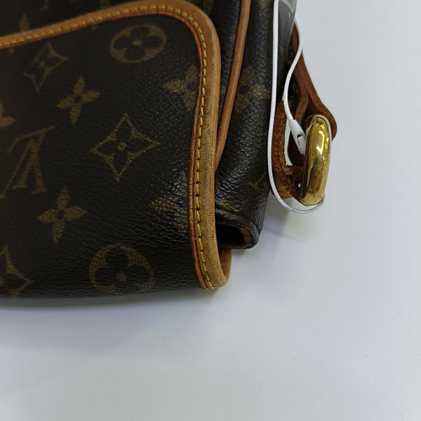 TIKAL Monogram Coated Canvas Brown