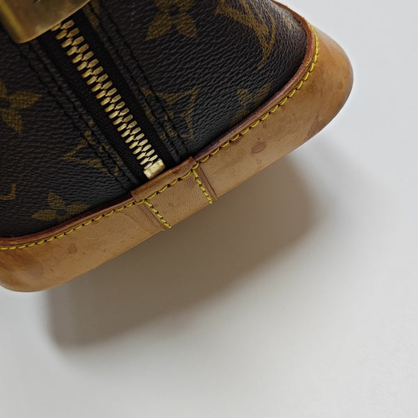 ALMA PM Monogram Coated Canvas Brown