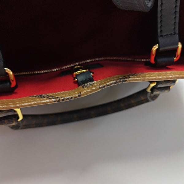 ONTHEGO MM Monogram Coated Canvas Brown