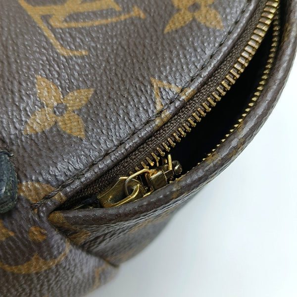Authenticated pre-owned PALM SPRINGS Mini Monogram Coated Canvas Brown - Backpack at Looply